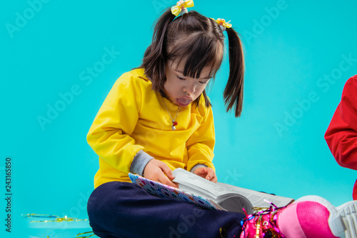 Fotografia, Obraz Dark-haired young girl with mental disorder pushing out tongue