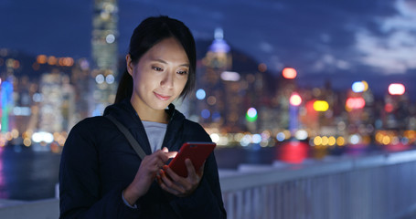 Canvas Print - Woman use of mobile phone at night