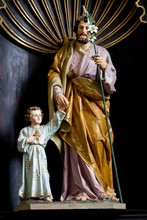Trnava, Slovakia. 2018/4/12. A Statue Of Saint Joseph Holding Little Jesus' Hand. The Saint John The Baptist Cathedral In Trnava.