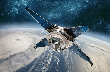 Wall Mural - space satellite monitoring from earth orbit weather from space, hurricane, typhoon on planet earth.
