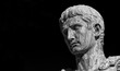 Caesar Augustus, first emperor of Ancient Rome. Old bronze statue in the Imperial Forum (Black and White with copy space)