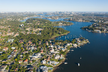 Wall Mural - Aerial view of the Parramatta river and the Sydney city skyline to the east.