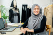 © Atstock Productions - Asian muslim woman designer in her tailor shop