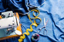 Sewing Indigo Denim Jeans With Sewing Machine, Garment Industrial Concept.