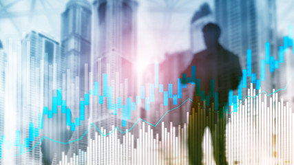 Stock trading candlestick chart and diagrams on blurred office center background.