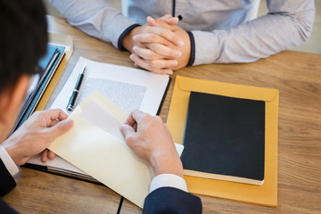 businessman hand sending a resignation letter to executive boss dismissed worker quit out from company, Change job, unemployment, resign concept