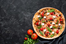 Tasty Pizza With Tomatoes And Mozzarella On Black Background. Top View, Copy Space For Text. Hot Italian Pizza