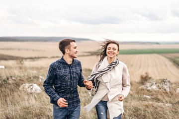 Wall Mural - Romantic young couple enjoy spending time together outdoor.