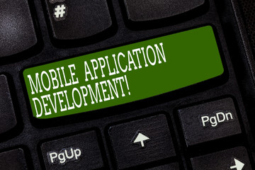Conceptual hand writing showing Mobile Application Development. Business photo text Writing software for digital devices Keyboard key Intention to create computer message idea