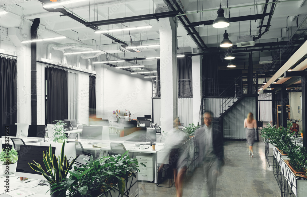 modern office interior with blurred business people in motion - obrazy, fototapety, plakaty 