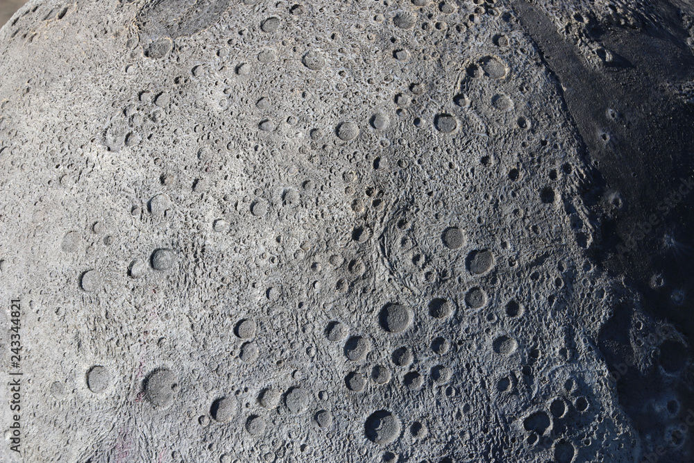 A picture of craters on the surface of the moon. - obrazy, fototapety, plakaty 