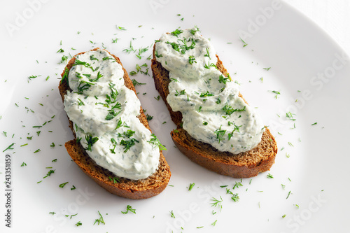 Cottage Cheese Feta And Dill Spread On Black Bread Decorated
