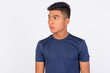 © Ranta Images - Young Asian man thinking against white background