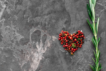 coloured pepper with love for bbq on stone, the heart of the cook, a symbol of love.