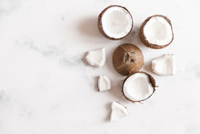 High Angle View Of Coconuts On White Table