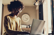 © Yakobchuk Olena - Cute lady using her netbook and smiling