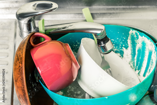 Fotografie, Obraz dirty dishes, cups, plates, spoons in the sink