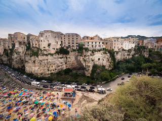 Wall Mural - Panorama of Tropea, Italy and the crowded beach of bathers.