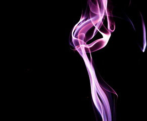 Purple smoke on black background