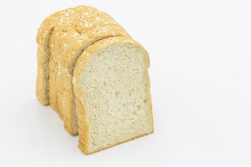 Sliced wholegrain bread on white background