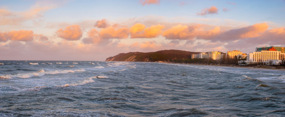 Wall Mural - colorful clouds of the baltic sea at sunset in winter. miedzyzdroje, poland