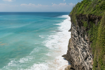 Above view of the ocean shore at Bali island