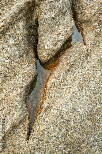 A Backwater On The Rocks Of The Kata Beach Of The Phuket