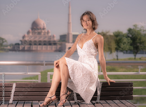 Fotografie, Obraz Caucasian Tourist visiting Putra Mosque in Malaysia
