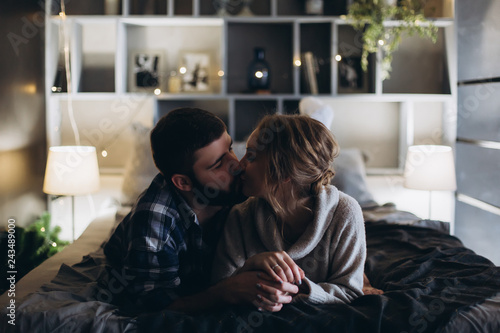 Young Positive Caucasian Couple Hugging And Relax In Cozy