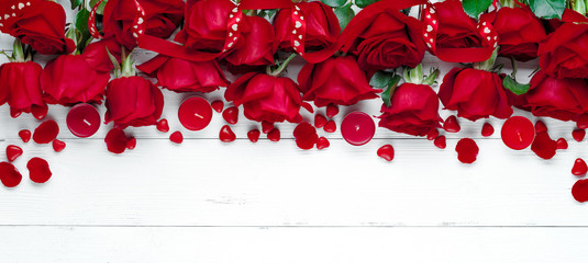 Wall Mural - Red rose on white wooden table