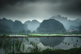 Fototapeta Łazienka - Vietnam nature landscape green mountains reflected in the water