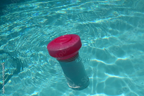 Close Up Of A Floating Swimming Pool Chlorine Dispenser In