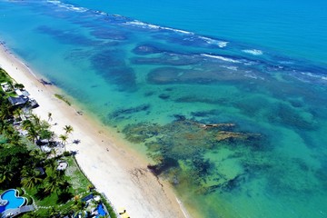 Aerial view of a paradise sea with clear water. Fantastic landscape. Great beach view. Arraia d’Ajuda, Bahia, Brazil