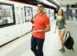 © JackF - Man with his girlfriend are standing on platform and choosing route