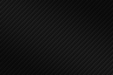 Abstract Seamless Background Of Black Carbon Fiber Texture.