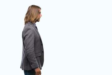 Canvas Print - Young handsome business man with long hair over isolated background looking to side, relax profile pose with natural face with confident smile.