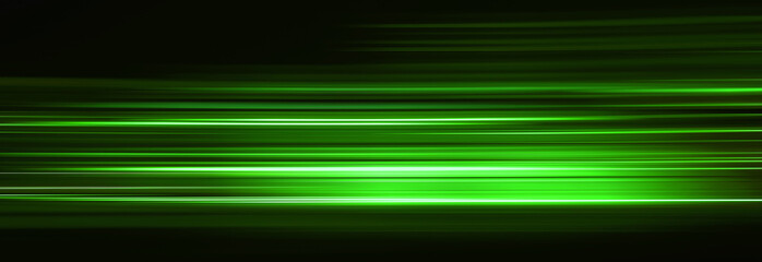 Wall Mural - Abstract green light trails in the dark, motion blur effect
