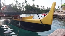 Hawaiian Outrigger Canoe Docked In Harbor