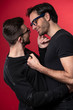 © Teodor Lazarev - Sexy young gay couple in love, embracing and hugging each other