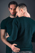 © Teodor Lazarev - Sexy young gay couple in love, embracing and hugging each other