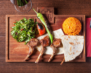 Arabic food, Pirzola - Delicious grilled lamb chops, beautifully arranged oriental meat dinner