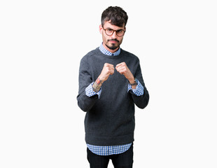 Sticker - Young handsome smart man wearing glasses over isolated background Ready to fight with fist defense gesture, angry and upset face, afraid of problem