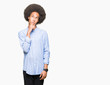 © Krakenimages.com - Young african american man with afro hair with hand on chin thinking about question, pensive expression. Smiling with thoughtful face. Doubt concept.