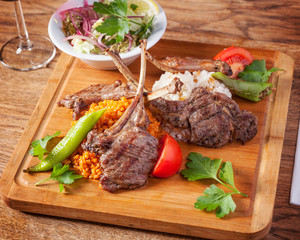 Arabic food, Pirzola - Delicious grilled lamb chops, beautifully arranged oriental meat dinner