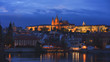 night time view of prague castle and the vltava river in prague, czech republic