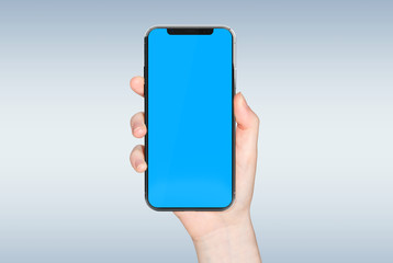 Wall Mural - woman hand holding modern smatphone mockup on white