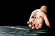 Woman with wrist bandage and word help written on her palm. Suicide awareness concept