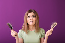 Woman With Hair Loss Problem On Color Background