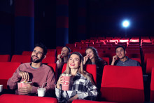 People Watching Movie In Cinema