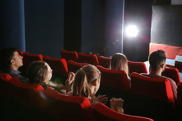 Canvas Print - People watching movie in cinema